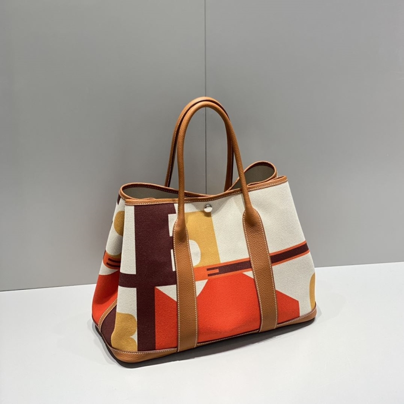 H**mes shopping bags